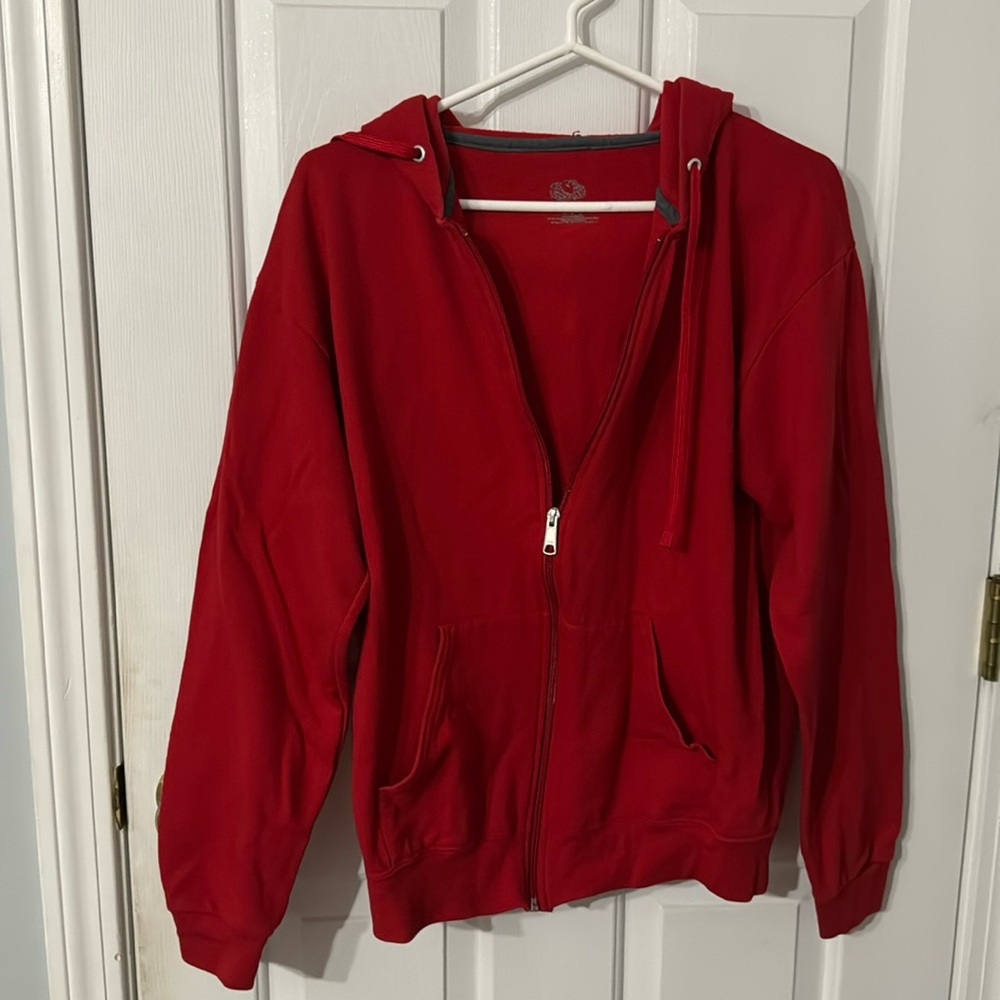 Bright red zip up hoodie. Barely worn.